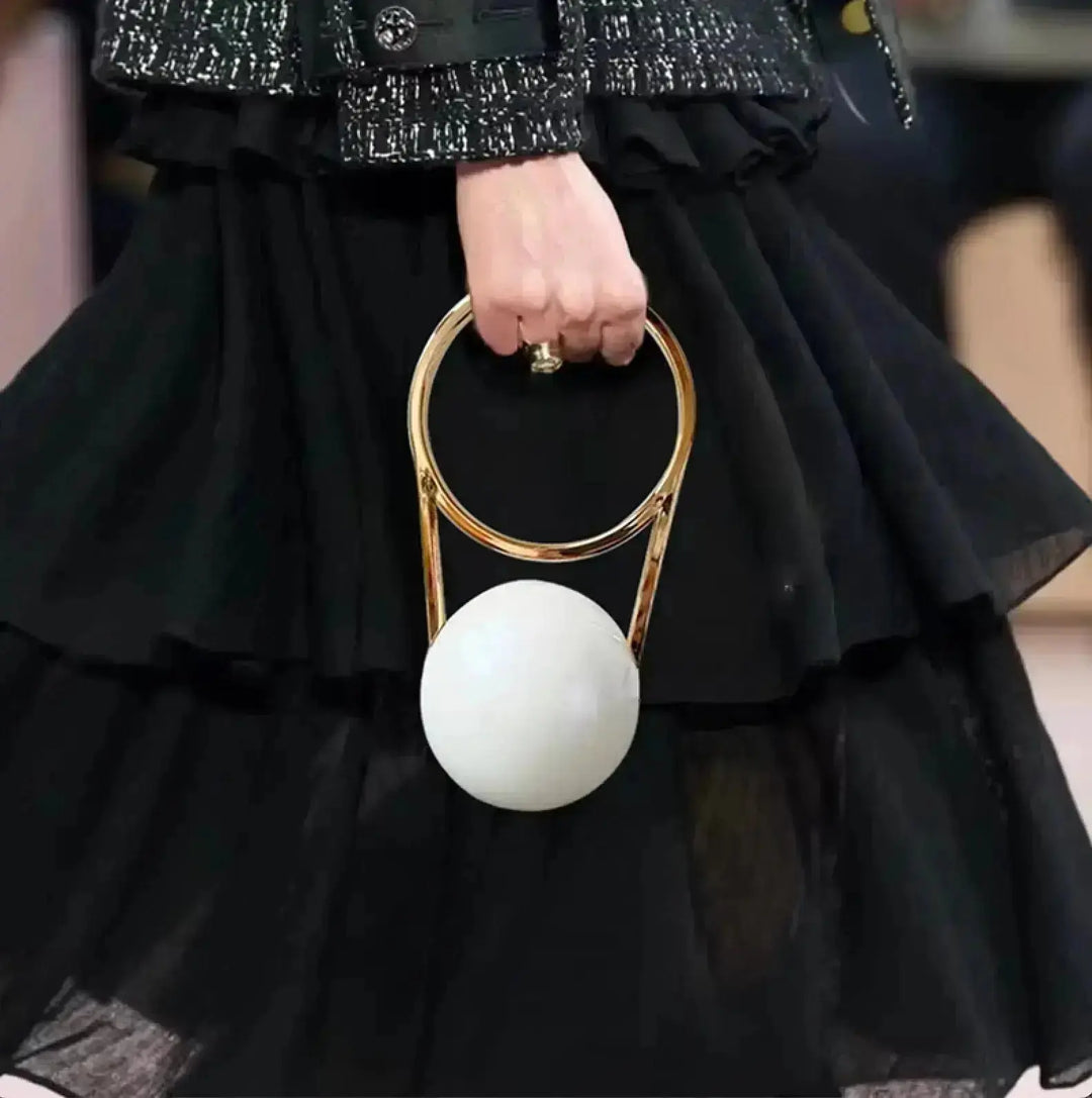 Eclipsera Orb Clutch – standout glam look for special occasions
