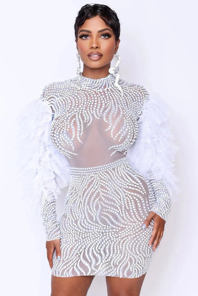 Model in Marilyn mini dress with feathers