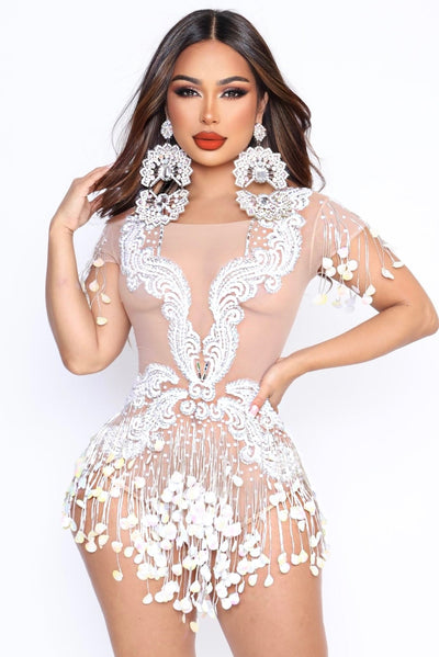 Model wearing Motivation sheer mesh leotard 