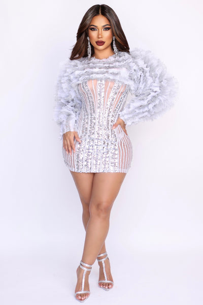 Model wearing Phenom sheer mini dress