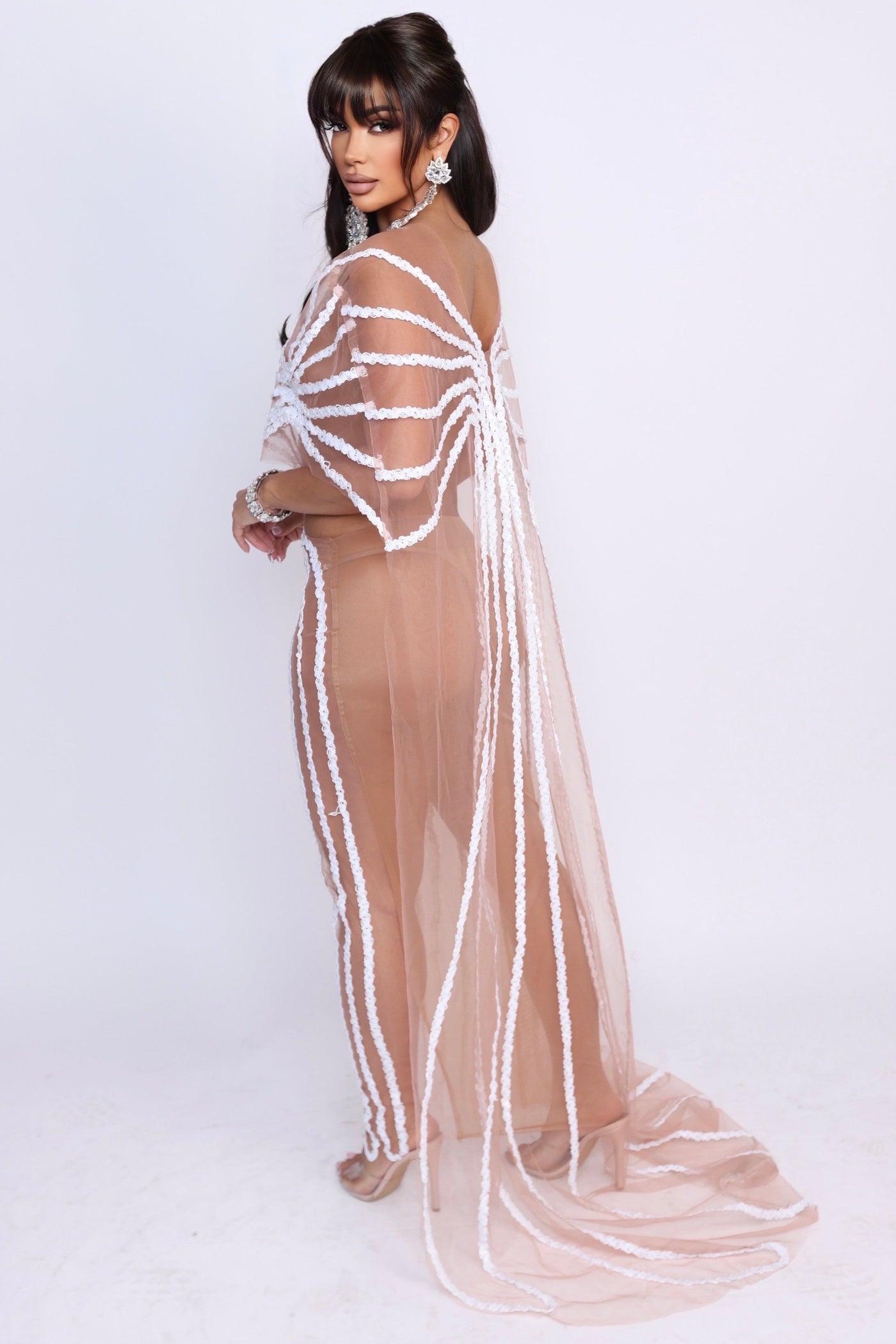 Sideview of model wearing Sugar Sprinkle dress