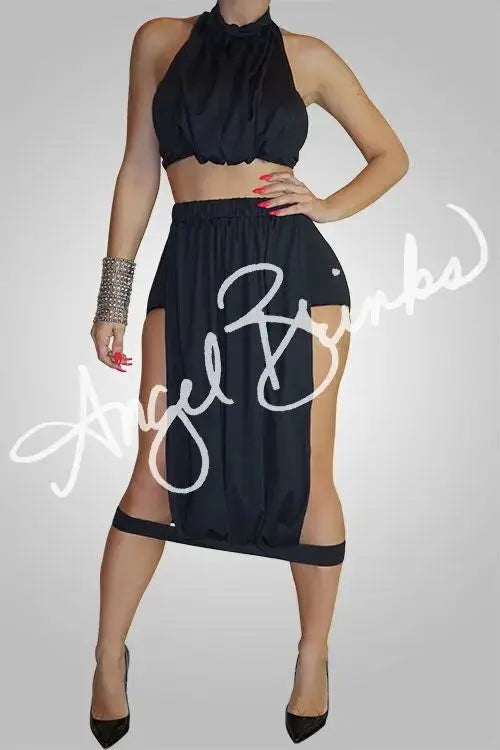 Front view of two-piece lycra set with fitted crop top and high-waisted skirt, shown on model with hourglass shape.