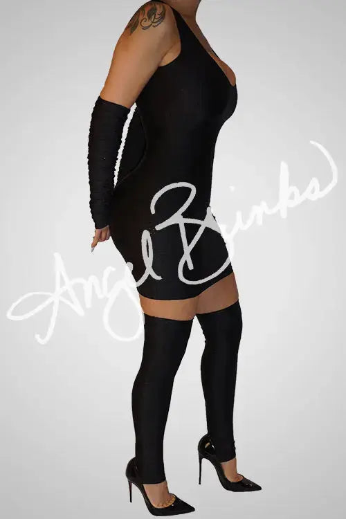 Side profile of the dress showing the curve-enhancing silhouette and smooth fit of the stretchy lycra fabric, paired with coordinated accessories.