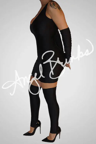 Side profile of the dress showing the curve-enhancing silhouette and smooth fit of the stretchy lycra fabric, paired with coordinated accessories.